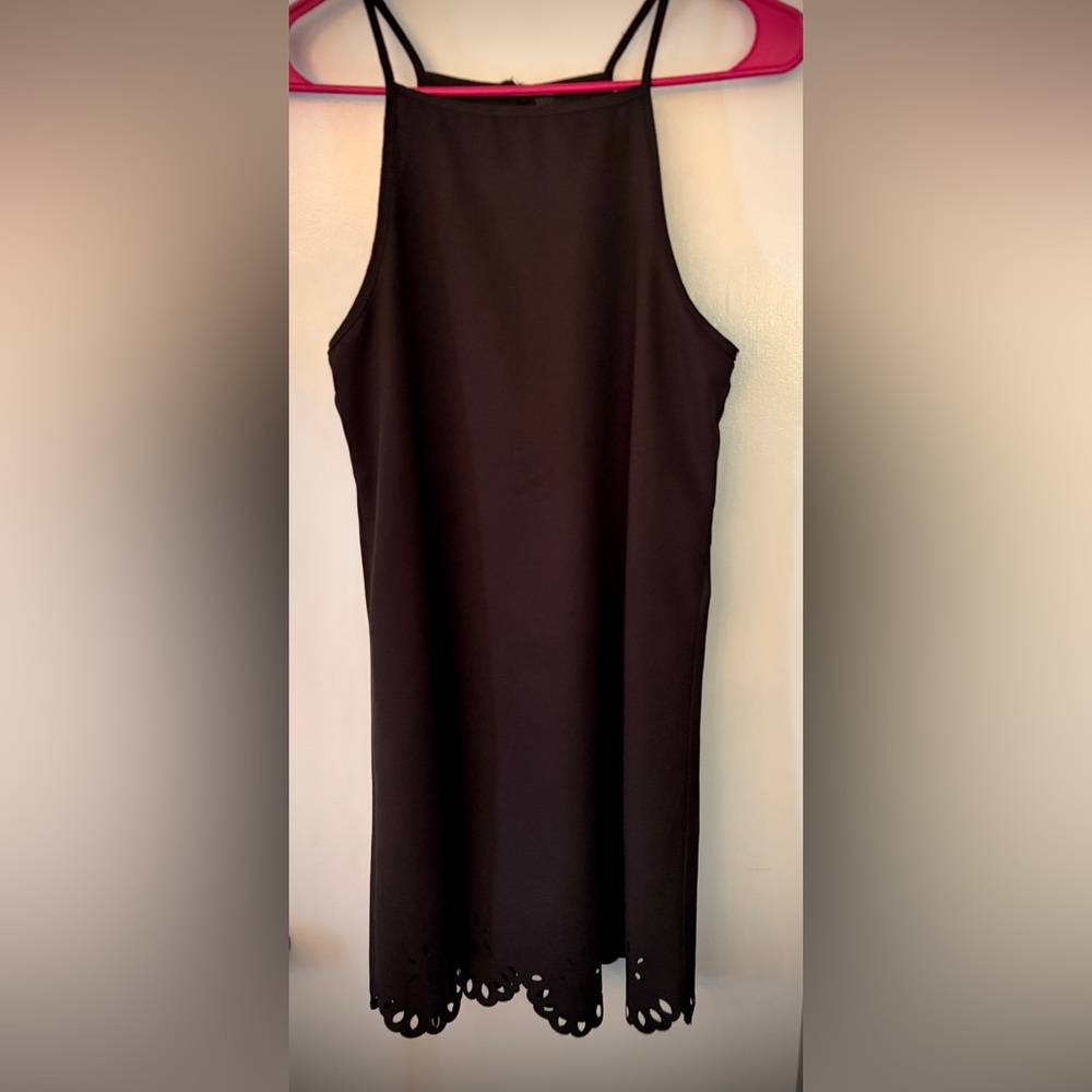 Elegant Black Midi Dress with Cutout Hem